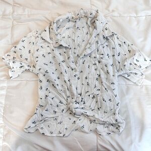 white and blue flowered button up blouse